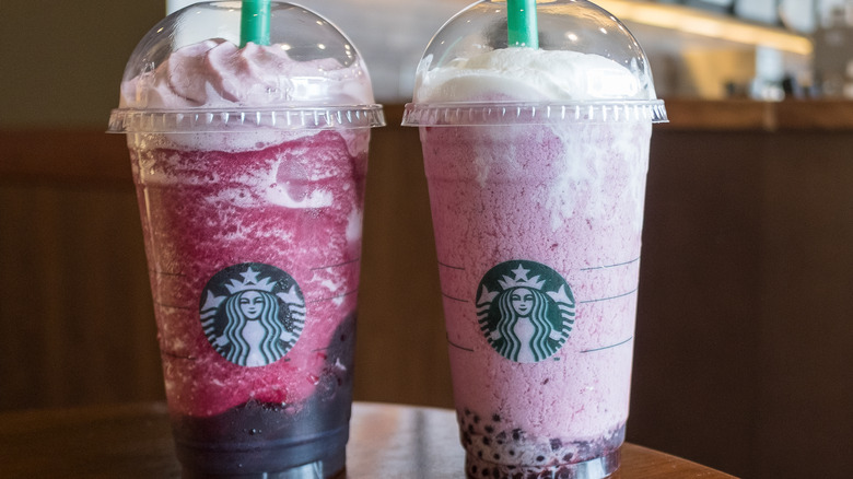 Pair of pink Starbucks Frappuccinos