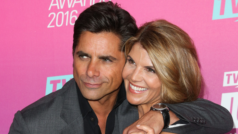 John Stamos and Lori Loughlin smiling