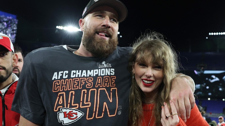 Taylor Swift and Travis Kelce hugging