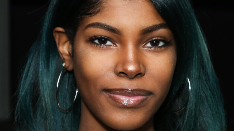 Diamond White attending an event