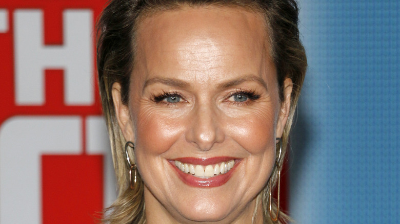 Melora Hardin smiling at film premiere 