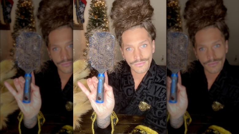Jonathan Monroe TikTok video about washing hairbrush