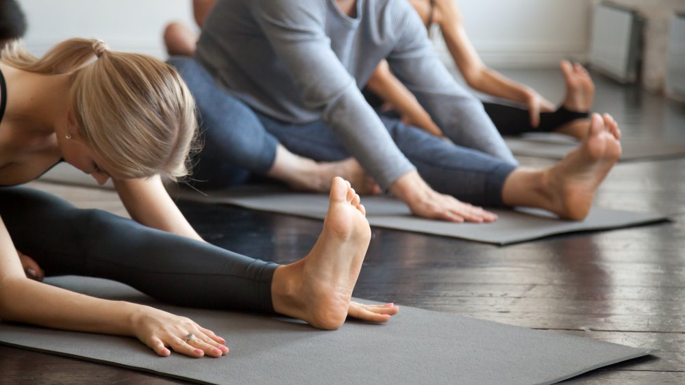 People doing a yin yoga class