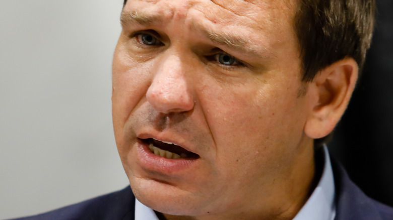 close up of Ron DeSantis looking concerned