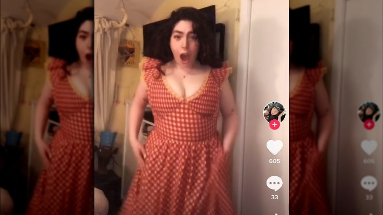 Woman wears the Lisa Says Gah Anoki Mini Dress on TikTok
