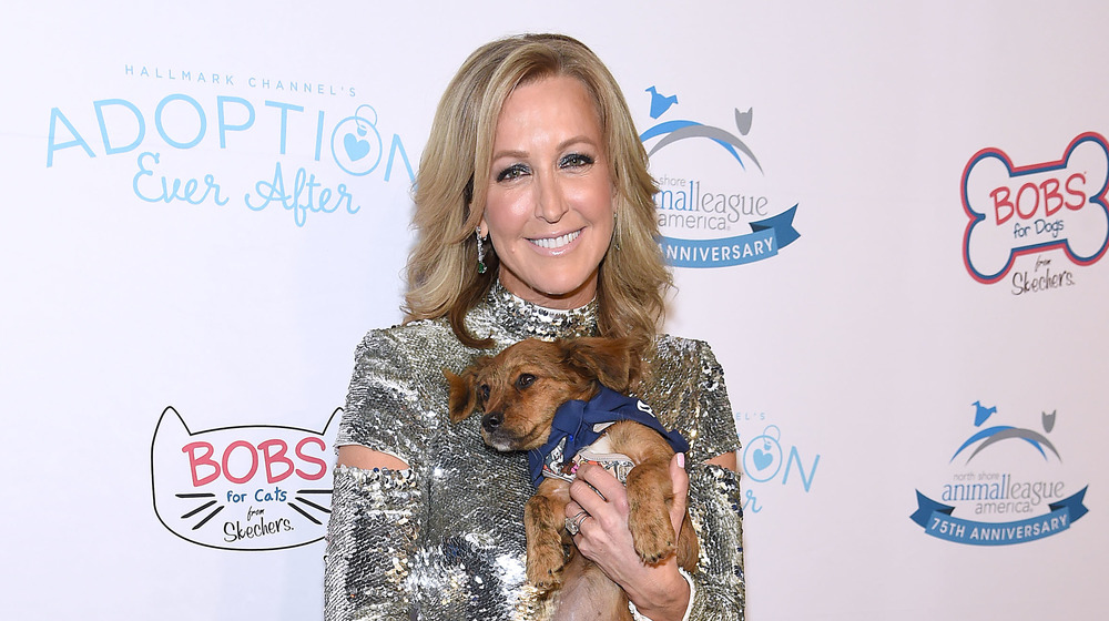 Lara Spencer with her dog on the red carpet