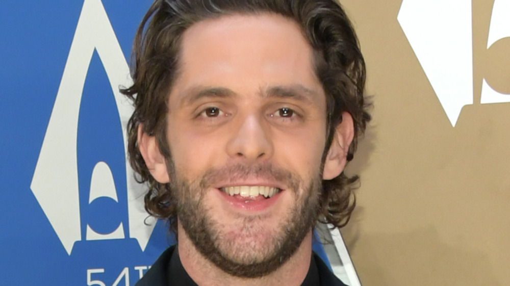 Thomas Rhett smiling