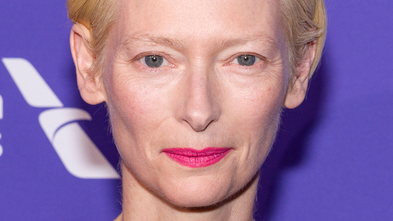 Tilda Swinton posing at event