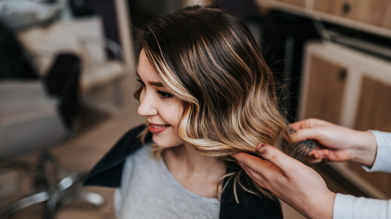 Woman with highlighted hair at the salon