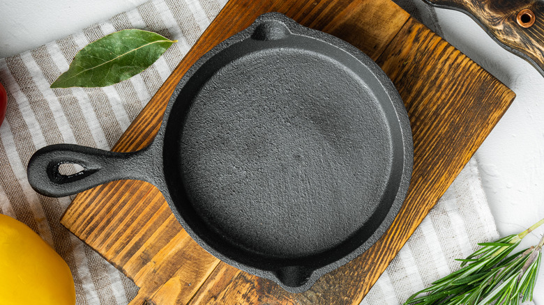 Cast iron skillet on wooden block