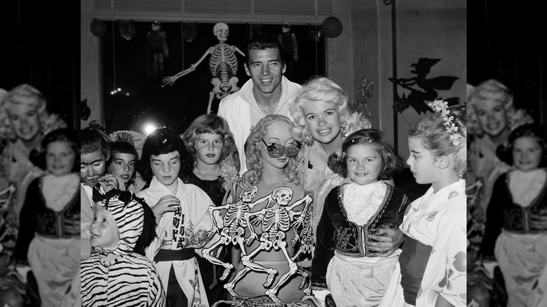 Jayne Mansfield and Mickey Hargitay have a Halloween and Birthday party for daughter Jayne Marie Mansfield in Los Angeles,California.