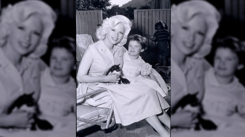 Jayne Mansfield and her daughter Jayne Marie with a pet chihuahua.