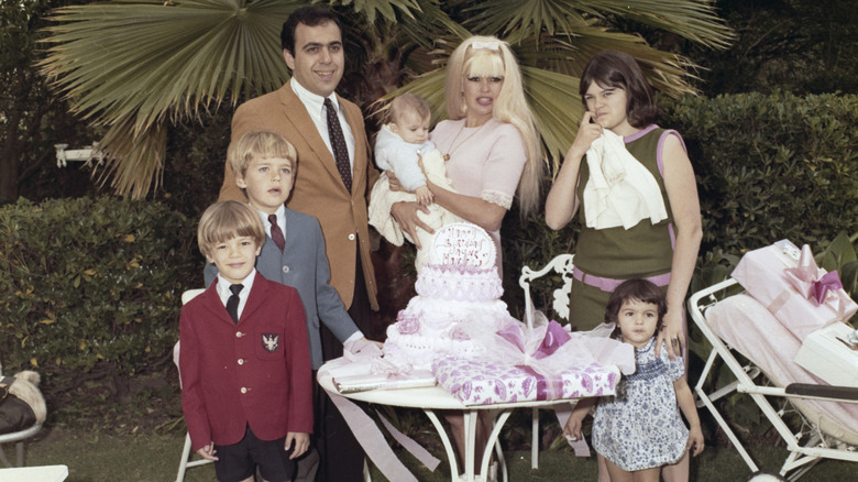 Jayne Mansfield (1933 - 1967) celebrating her 34th birthday with her family on the set of 'Single Room, Furnished' in Hollywood, California, April 1967.
