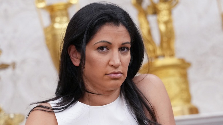 Katie Miller listens in the Oval Office of the White House in Washington, DC (2025)