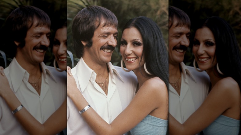 Cher, right, with her arms around Sonny Bono