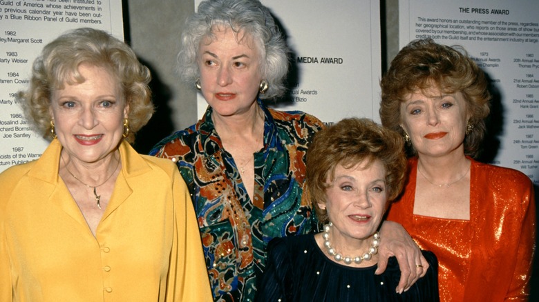 Betty White, Bea Arthur, Estelle Getty, and Rue McClanahan posing for cameras