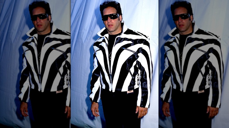 Andrew Dice Clay wearing a black and white striped leather jacket and sunglasses at the 1989 MTV VMAs.