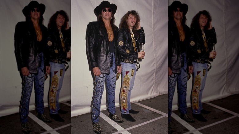 Richie Sambora and Jon Bon Jovi wearing leather jackets and heavily embellished jeans at the 1989 MTV Video Music Awards.