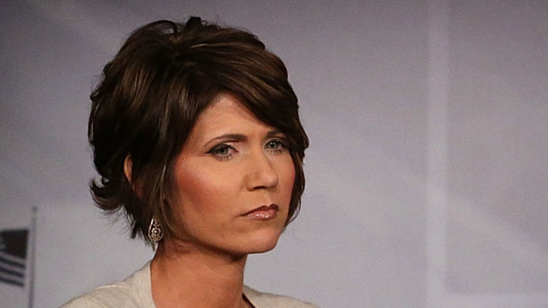 Kristi Noem with an asymmetrical, layered bob hairstyle