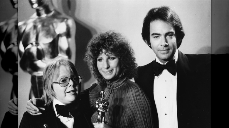 Barbara Streisand with Paul Williams and Neil Diamond, holding her Oscar at the 1977 Academy Awards