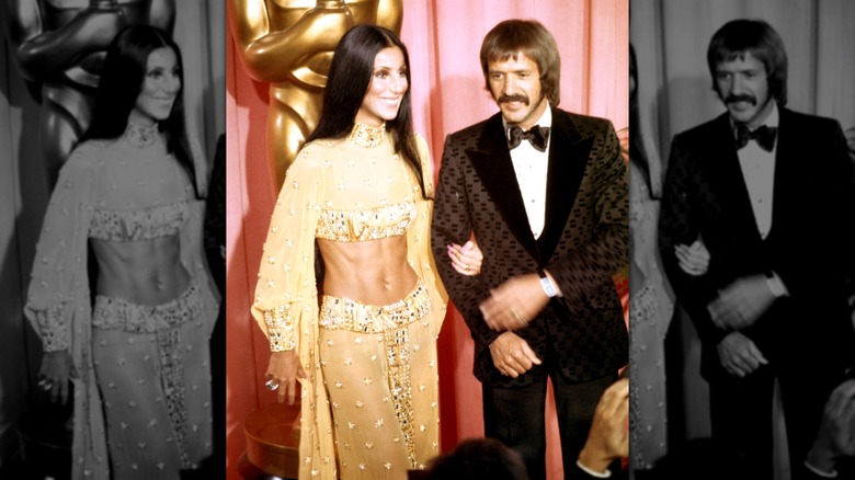Cher and Sonny Bono smiling on the Oscars red carpet in 1973