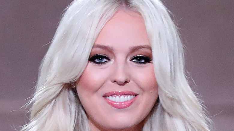 Tiffany Trump smiles with glossed lips.