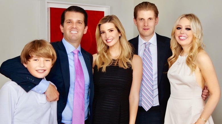 Barron Trump, Donald Trump Jr., Tiffany Trump, Ivanka Trump, and Eric Boulos smile as they pose for a photo (2020)