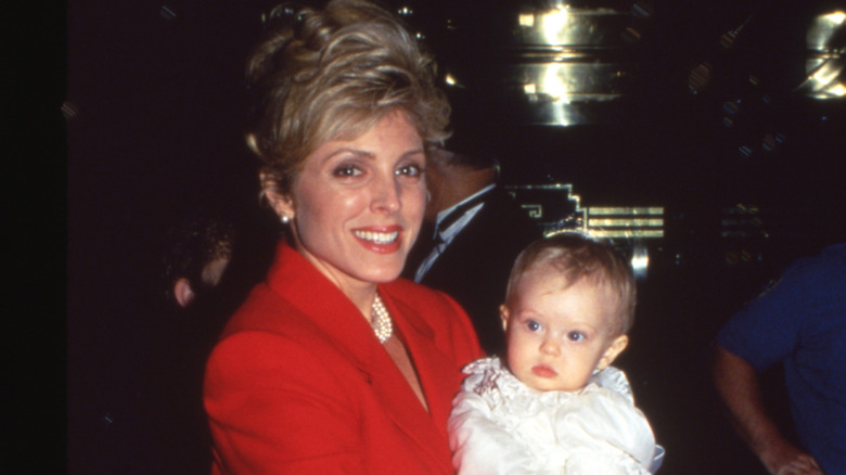 Marla Maples holds Tiffany Trump as a baby