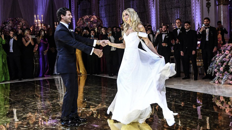 Michael Boulous and Tiffany Trump dance at their wedding