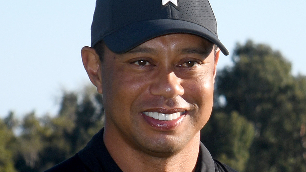 Tiger Woods smiles