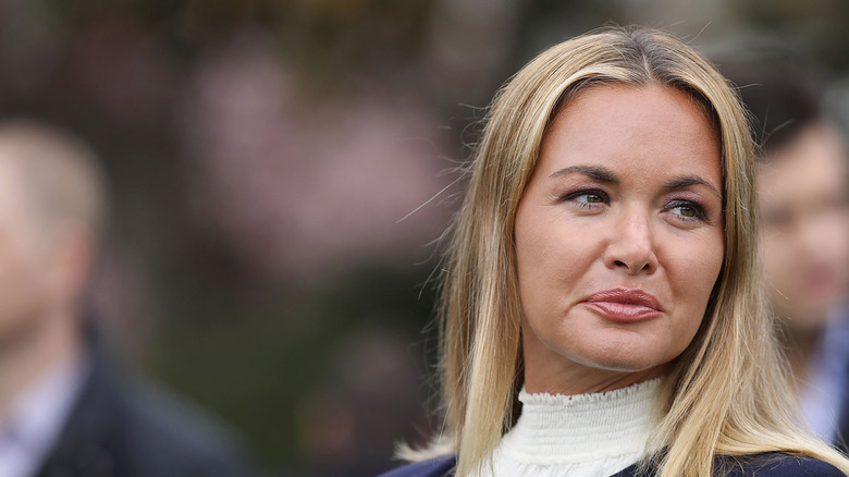 Vanessa Trump making a face in a navy blazer with a white top underneath