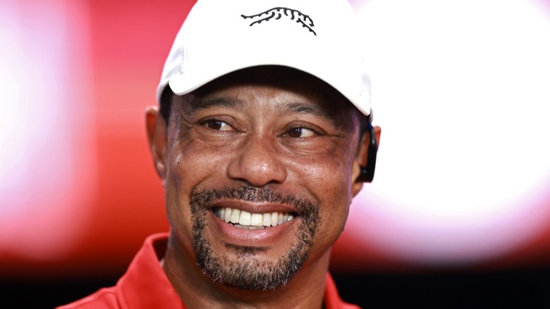Tiger Woods smiles after a golf match in Palm Beach Gardens, FL (2025)