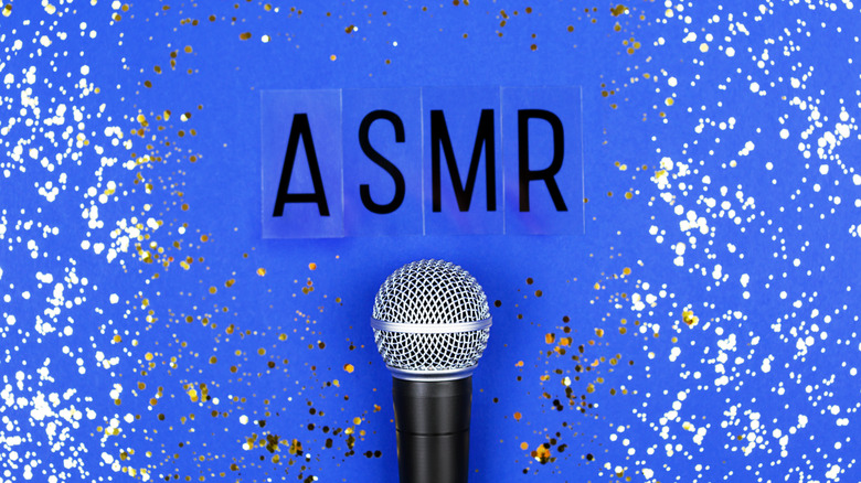 ASMR and a microphone on blue background 