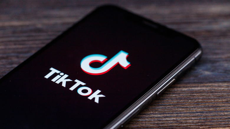 TikTok logo on phone