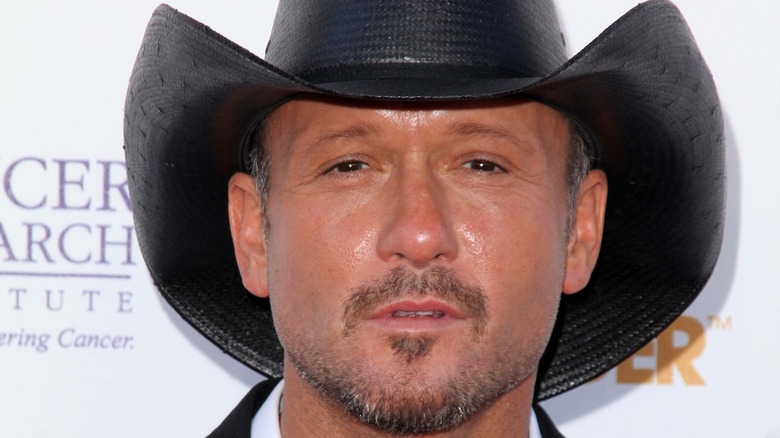 Tim McGraw poses on the red carpet.