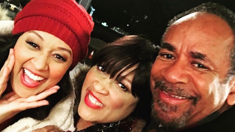 Tia Mowry, Jackée Harry, and Tim Reid smiling