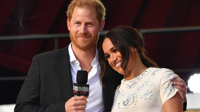 Prince Harry and Meghan Markle smiling