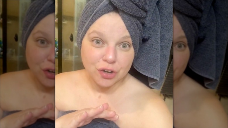 Amy King venting to followers in a towel