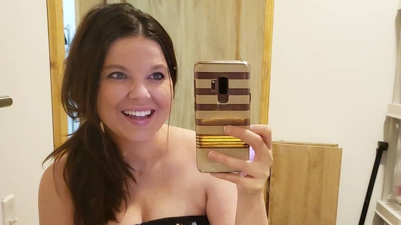 Amy King smiling with husband Dillon King