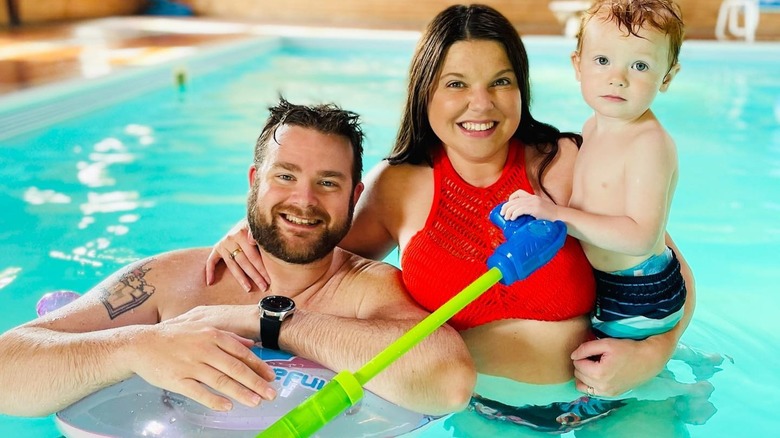 Amy King enjoying some pool time with husband Dillon King and their son Daxton King