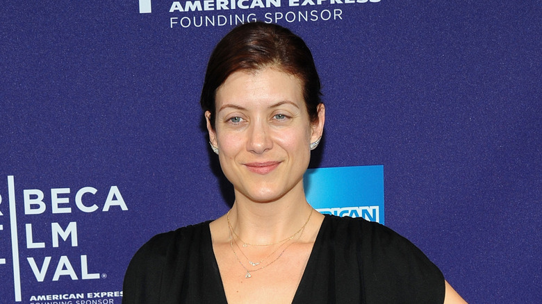 Kate Walsh without makeup in a black dress