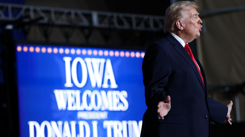Donald Trump puckering his lips during a rally in Iowa