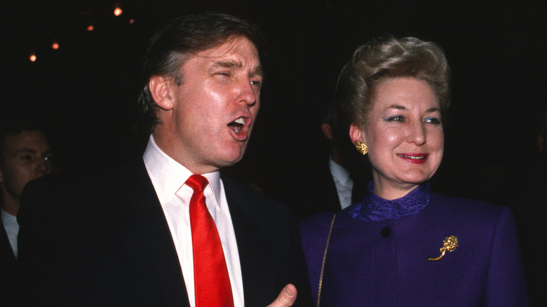 Donald speaking energetically alongside Maryanne Trump Barry, who's smiling