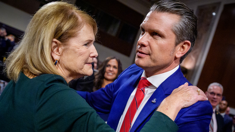 Penelope Hegseth and son Pete hugging at an event