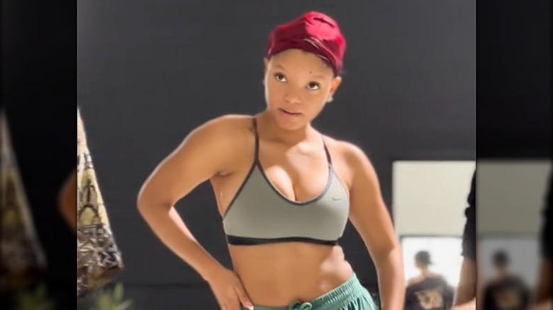 Halle Bailey hand on hip
