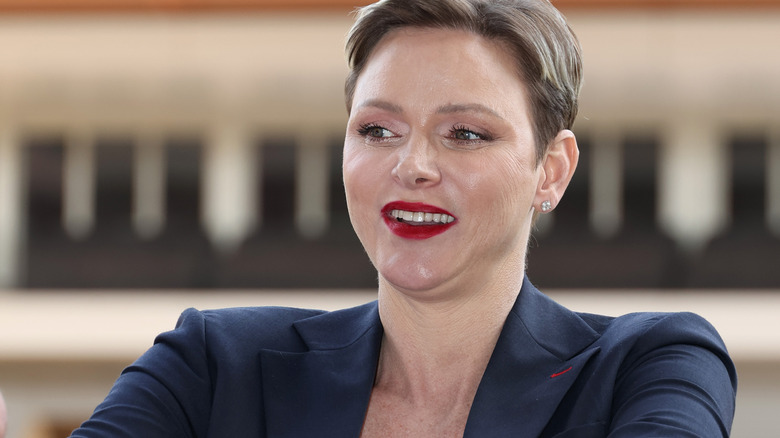 Princess Charlene smiling awkwardly