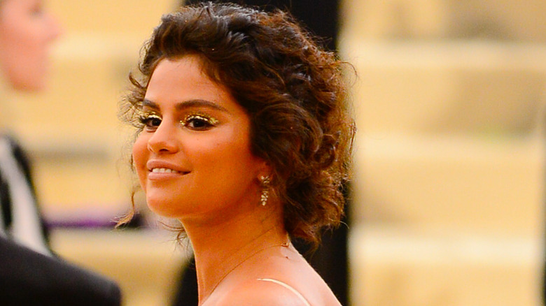 Selena Gomez at the Heavenly Bodies: Fashion & The Catholic Imagination Costume Institute Gala at The Met on May 7, 2018 in New York City
