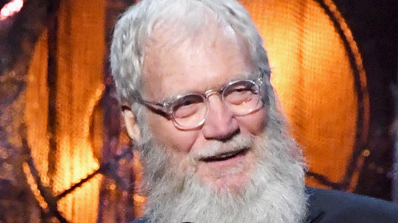 David Letterman speaking into a microphone