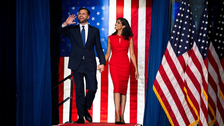 JD Vance and Usha Vance holding hands and walking