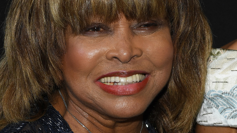 Tina Turner smiling with bangs